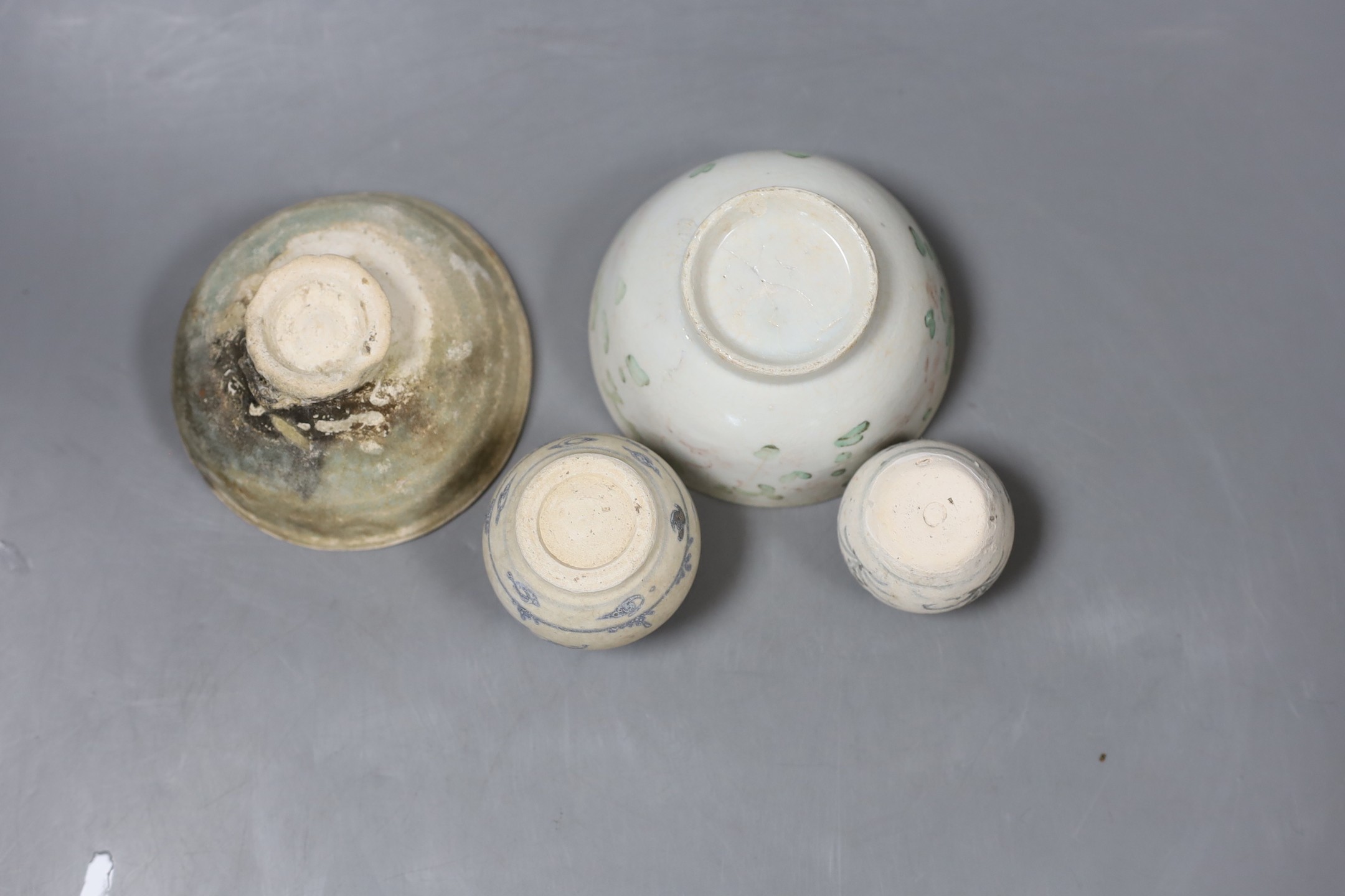 A group of shipwreck ceramics, to include two Ming jarlets, a Qingbai bowl and a Chinese polychrome bowl (4)